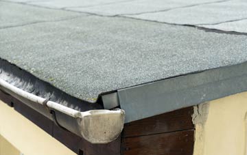 repair or replace Yspitty flat roofing?